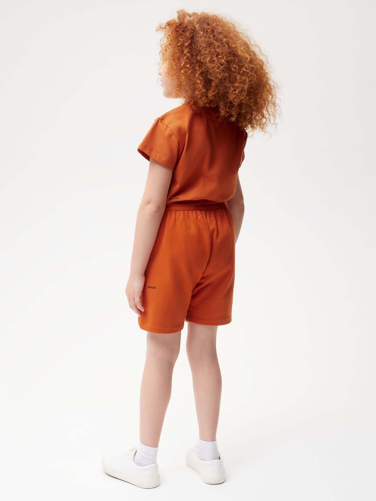 Kids' 365 Midweight Long Shorts—cinnamon orange - Image 3
